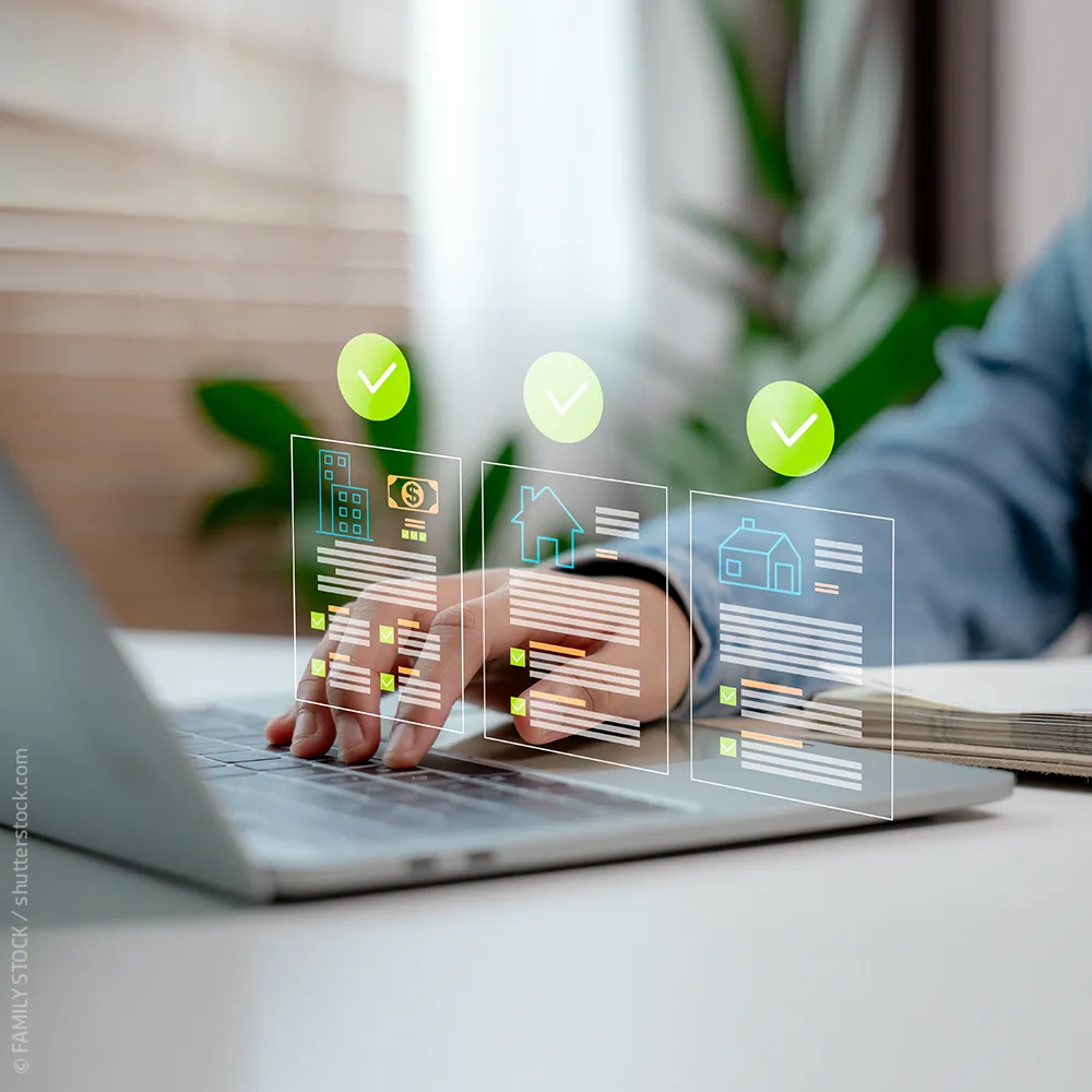 Einblendung über Laptop Webanwendung Mietverwaltung